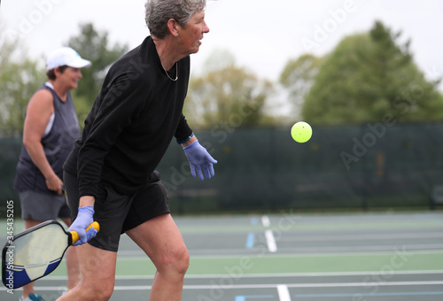 Pickleball is played with rubber gloves due to the Covid-19 pandemic. © Ron Alvey