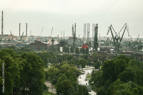 Panorama of the Gdansk shipyard with its distinctive cranes and ships being built and repaired. Also called stocznia gdanska, the shipyards are an industrial and historical landmark of Poland