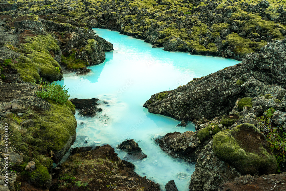 Turquoise colored water and sulfur texture at the blue lagoon near Keflavik in Iceland. Natural, landscape and background concept.