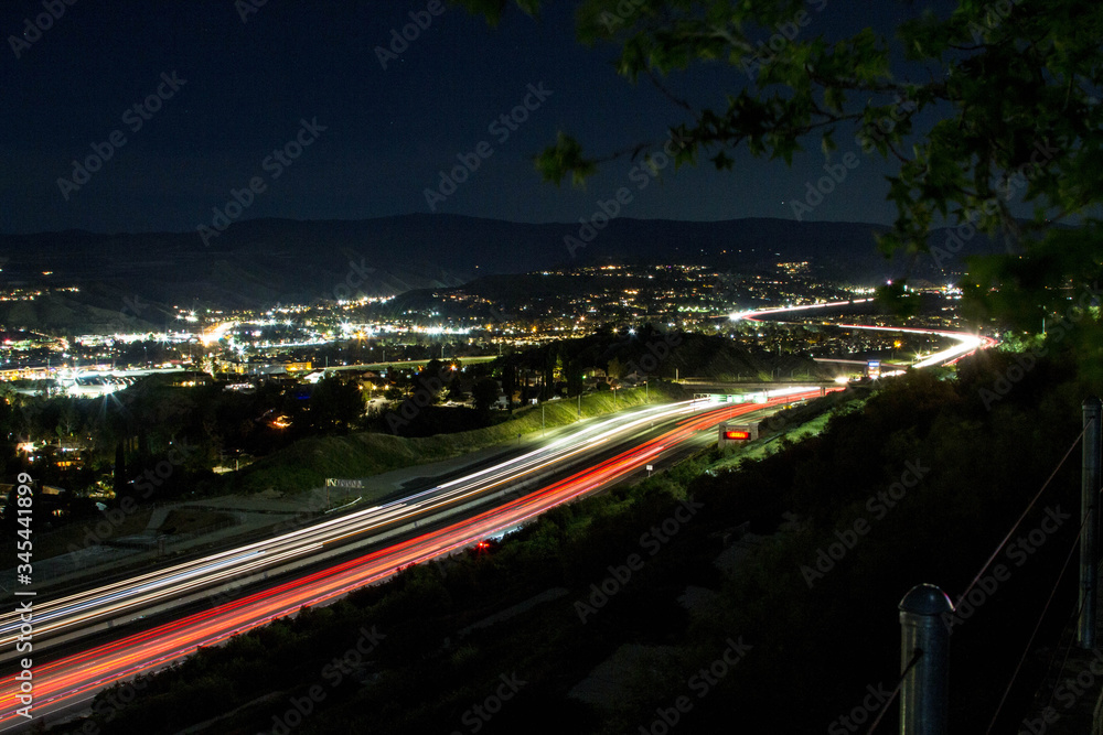 Fototapeta premium Freeway Lights with City