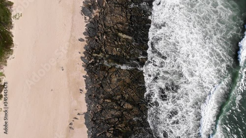 Beautiful seascape with supertubes. Aerial rising, birds eye photo