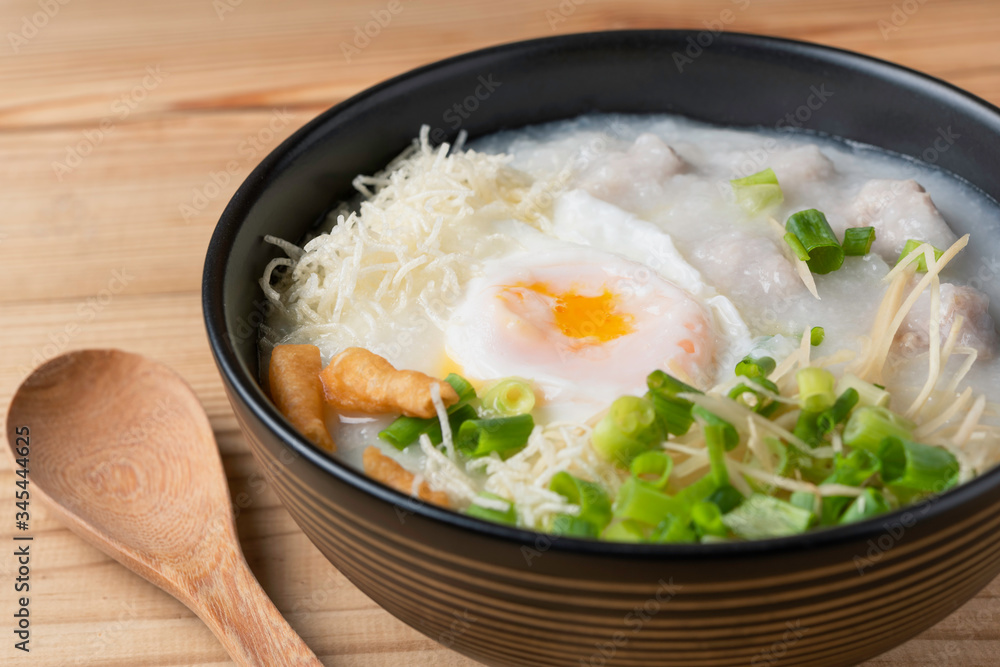 Minced pork with boiled eggs and topped with ginger and spring onions. Popular for breakfast and dinner.,rich soup asia food Minced pork with boiled eggs and topped with ginger and spring onions. Popular for breakfast and dinner.,rich soup asia food