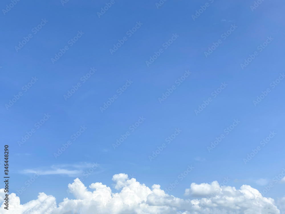 Fototapeta premium Nature view clear blue sky with white cloudy as background or wallpaper with copy space