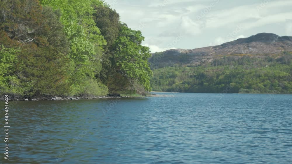 Scenic lake view tracking shot Ireland in Spring time Scenic lake view tracking shot Ireland in Spring time