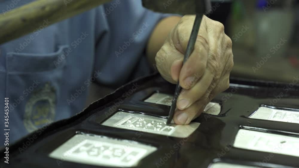 Craftsmen making jewelry From silver ore in the factory
