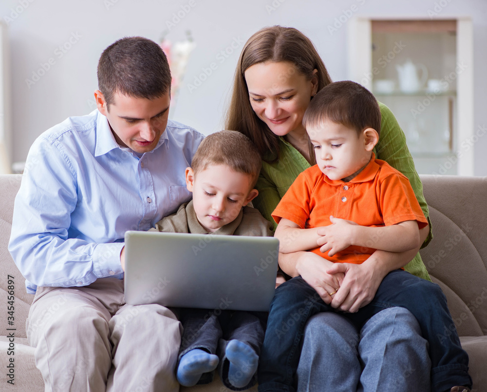 Young family surfing internet and looking at photos Young family surfing internet and looking at photos