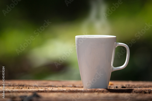 Coffee cup on natural blurred background
outdoor