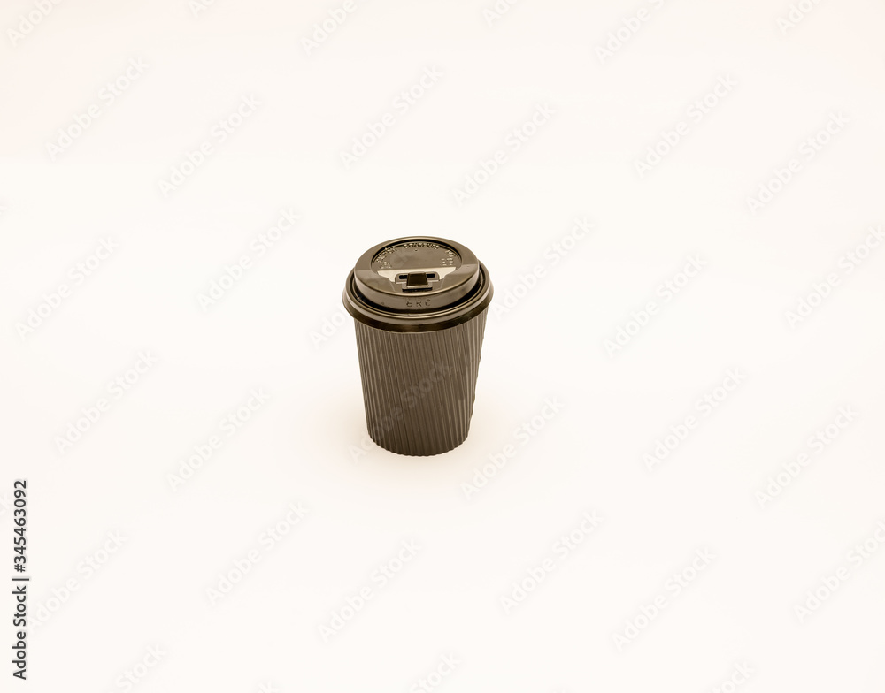 Recyclable take out coffee or teacups with lids isolated against a white background. Recyclable take out coffee or teacups with lids isolated against a white background.