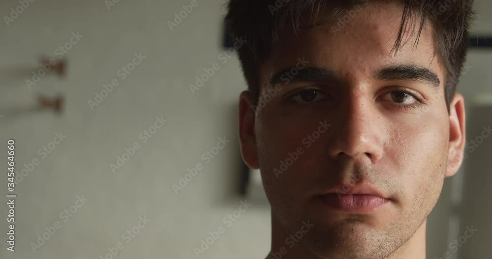 Close up portrait of male rower looking at camera Close up portrait of male rower looking at camera