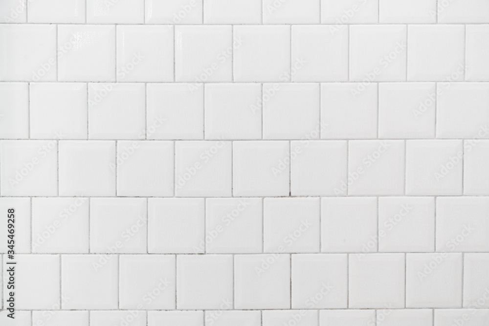 Naklejka premium White tile interior wall background.
