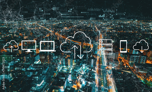 Cloud computing with aerial cityscape view of Japan at night