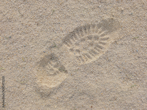 Footprint shoe on beach 