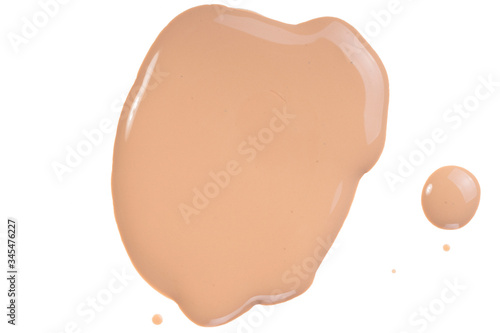 Beige liquid foundation, concealer smear smudge. Makeup tone cream swatch isolated on white