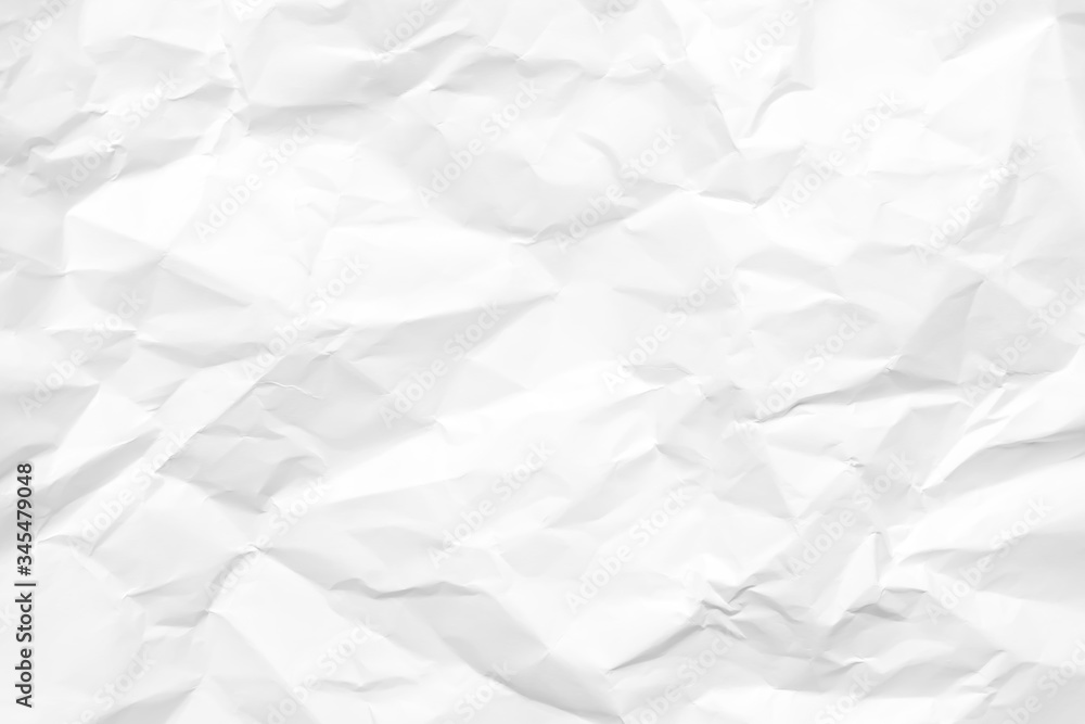White crumpled paper texture background. Clean white paper. Top view. White crumpled paper texture background. Clean white paper. Top view.