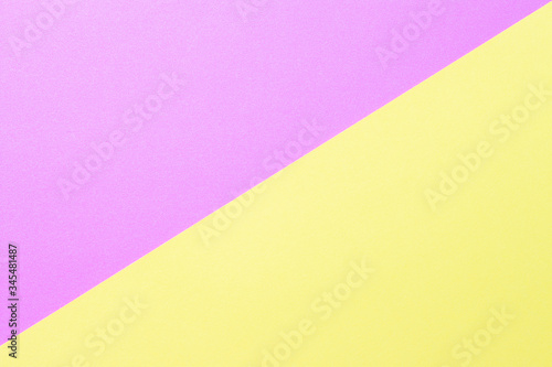 Abstract background of pink and yellow color, a top view, close-up, contrasting color