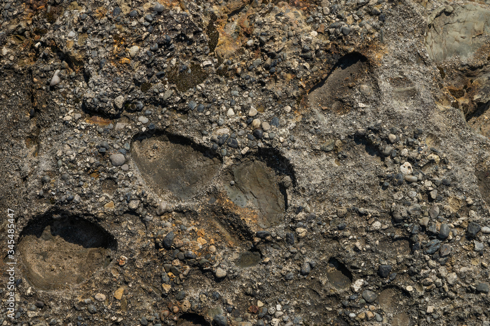 Texture of stone, rocks, textured orange with hard light Texture of stone, rocks, textured orange with hard light