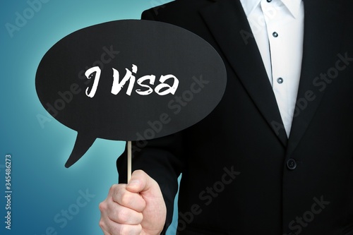 J Visa. Lawyer in suit holds speech bubble at camera. The term J Visa is in the sign. Symbol for law, justice, judgement