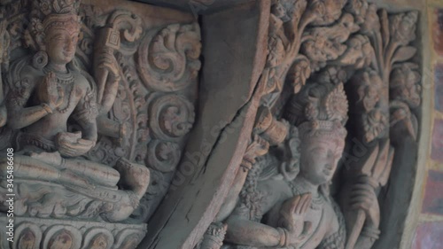 Wallpaper Mural Ancient And Religious Wood Carvings Decorated On The Brick Wall. Patan Durbar Square In Kathmandu, Nepal.  - close up panning shot Torontodigital.ca