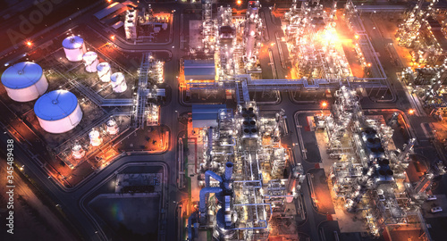 Large oil refinery industrial estates. Fuel refinery industry at night