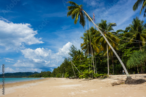 Completely deserted tropical beach in high season due to the Covid-19 Coronavirus lockdown and travel restrictions photo