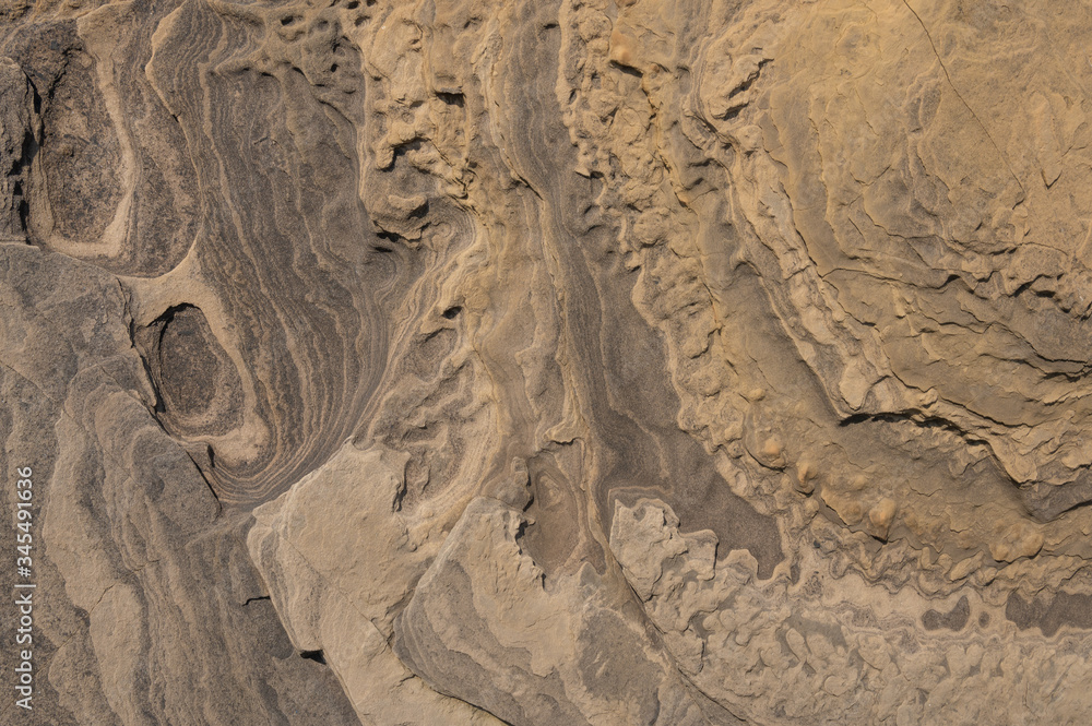 Texture of washed rock, stone. Orange. Wavy, for design. Texture of washed rock, stone. Orange. Wavy, for design.