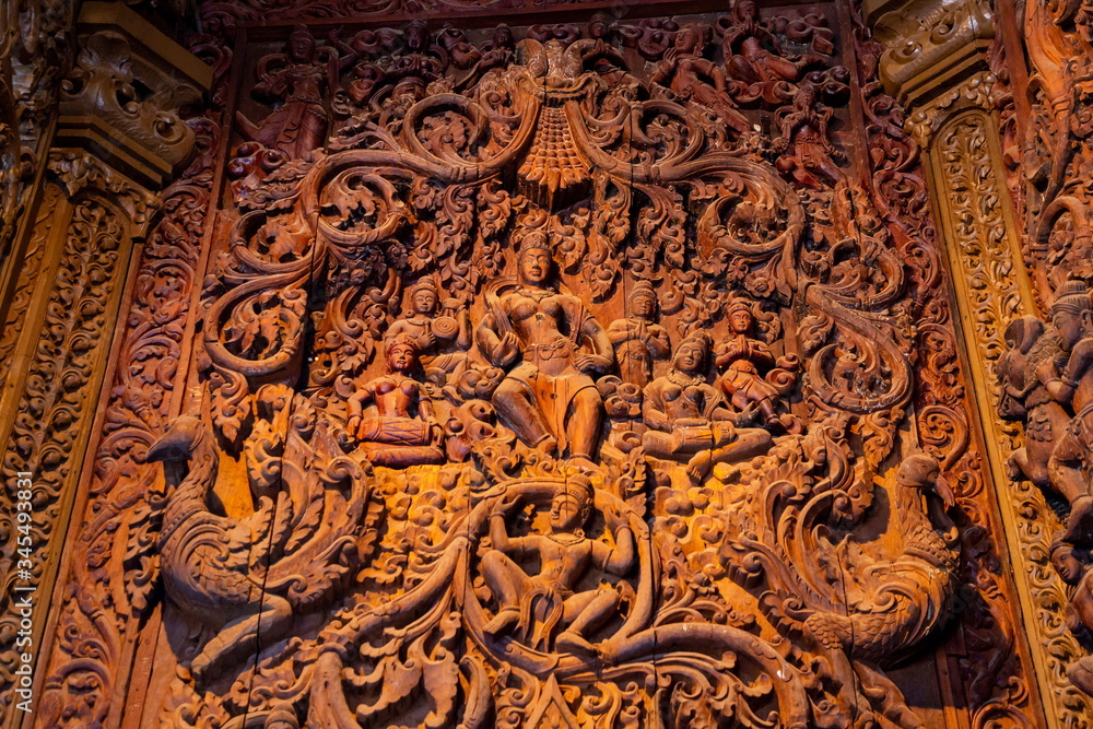 wooden historic carving texture at door in temple .