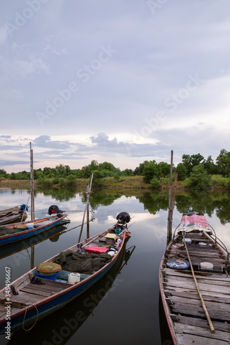 fisherman boat on river at countryside .