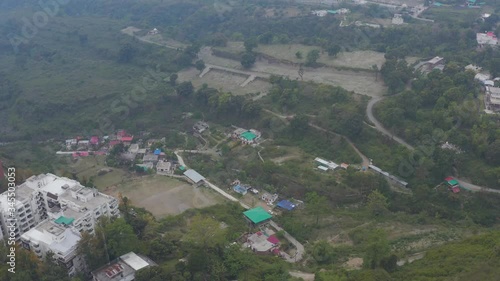 Dehradun, Uttarakhand/India- May 2 2020: World disaster . Coronavirus 3 Lockdown in India. Aerial views of empty roads , shops closed in india uttarakahnd dehradun   .  Aerials 4k photo