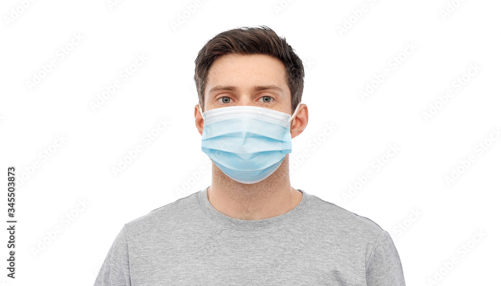 health, quarantine and pandemic concept - portrait of young man wearing medical mask for protection from virus disease on white background health, quarantine and pandemic concept - portrait of young man wearing medical mask for protection from virus disease on white background