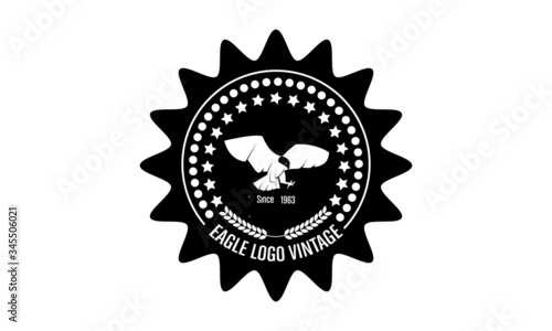 vintage-style emblem logo with an eagle theme photo