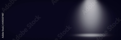 Abstract dark blue background with a gradient and emulation of light from a lantern. Can be used for presentation. Banner. Flat lay, top view