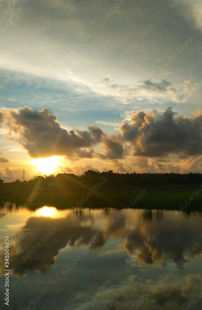 Fototapeta premium sunset over the river