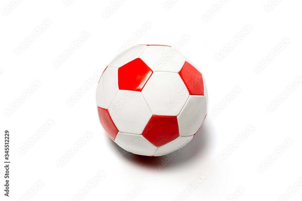 Soccer ball on a light isolated background. Concept game for children, football, physical development. Flat lay, top view Soccer ball on a light isolated background. Concept game for children, football, physical development. Flat lay, top view