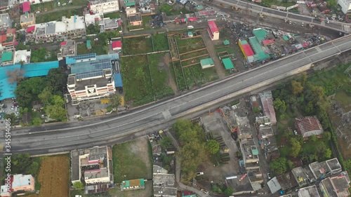 Dehradun, Uttarakhand/India- May 2 2020: World disaster . Coronavirus 3 Lockdown in India. Aerial views of empty roads , shops closed in india uttarakahnd dehradun   .  Aerials 4k photo