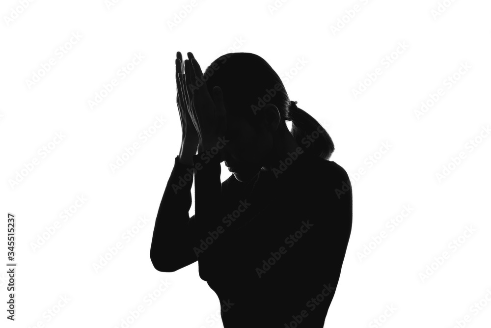 black and white image of a woman's silhouette, portrait, headache, domestic violence black and white image of a woman's silhouette, portrait, headache, domestic violence