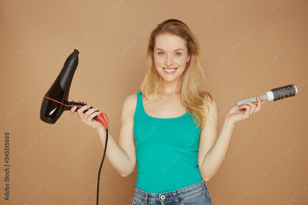 Beautiful woman with a hair dryer Beautiful woman with a hair dryer