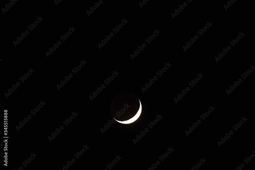 Young Moon and Venus on a dark night sky. Young Moon and Venus on a dark night sky.