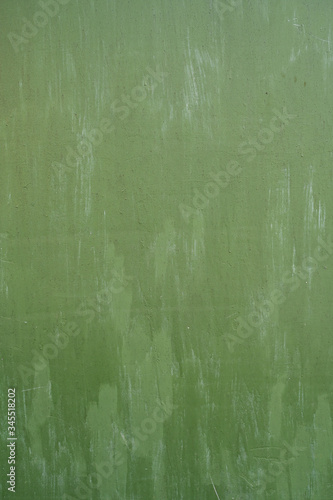green metal background. poured paint. metal texture can be used as background