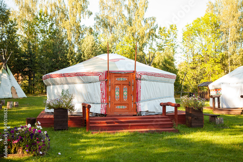Tipi dwelling, Yurt in the forest. photo