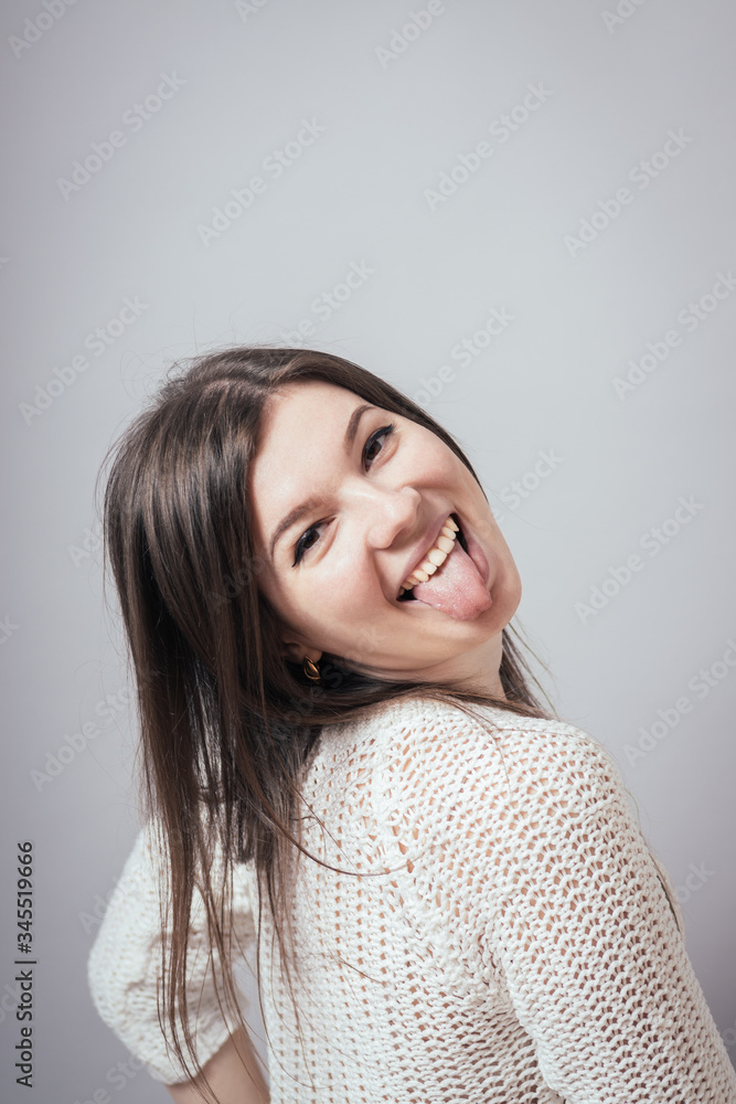 girl shows tongue girl shows tongue