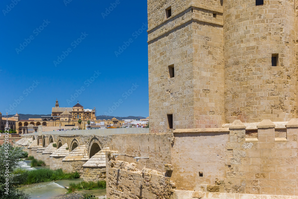 Historic city gate and roman bridge in Cordoba, Spain
