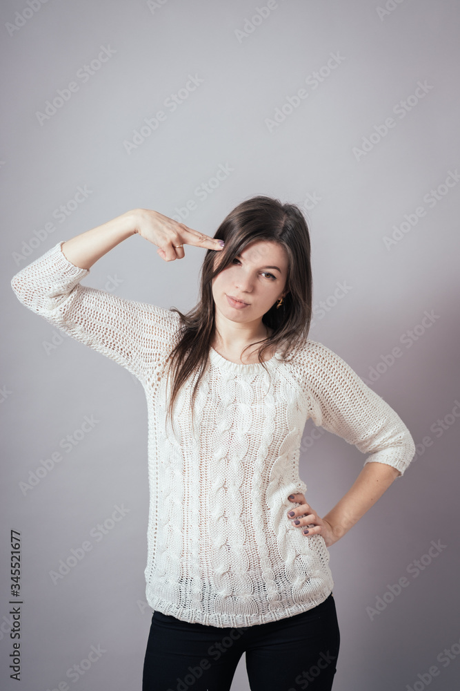 girl, pointing to his head girl, pointing to his head