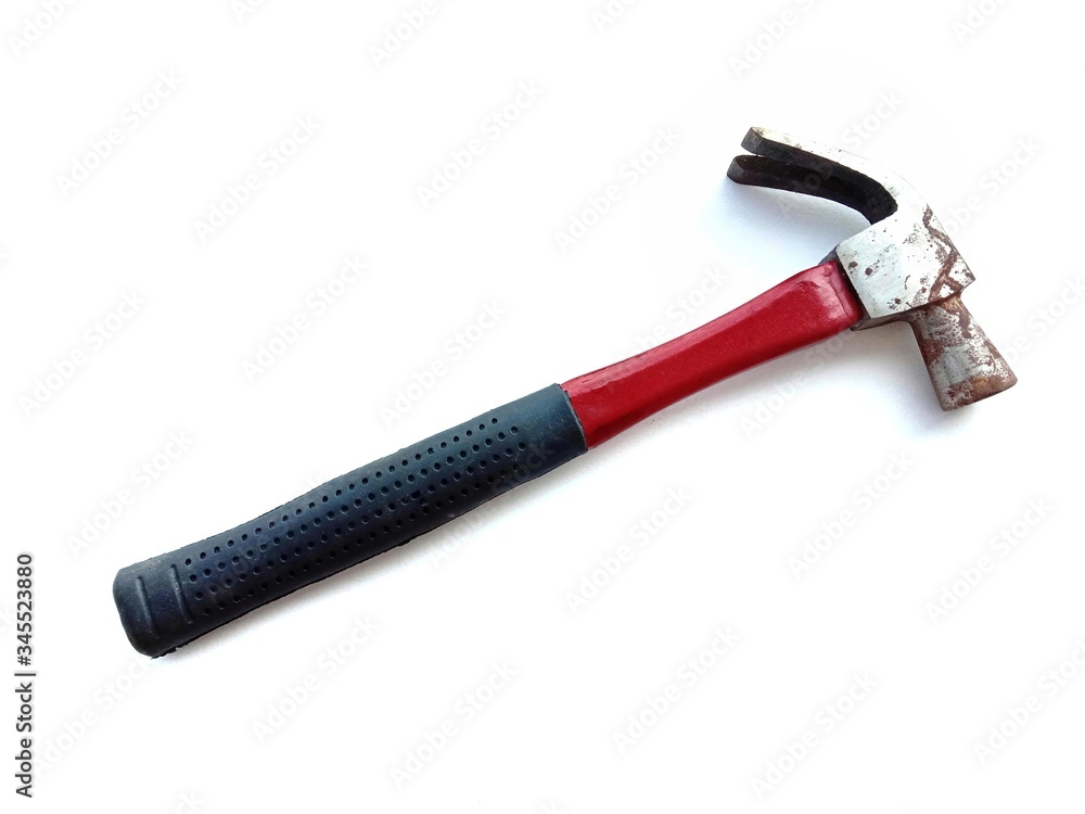 Rusty metal hammer, the handle is red wood and black rubber hardware tools isolated on white background closeup. In Samut Sakhon, Thailand. Rusty metal hammer, the handle is red wood and black rubber hardware tools isolated on white background closeup. In Samut Sakhon, Thailand.