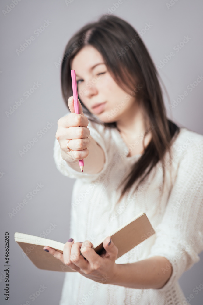 girl with pencil and notepad girl with pencil and notepad