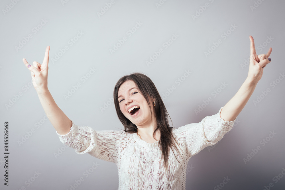 girl showing rock girl showing rock