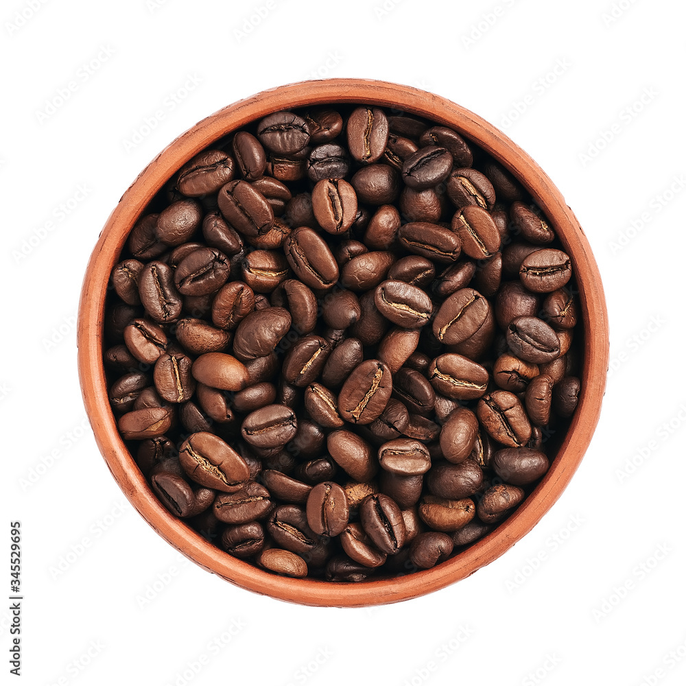 Roasted coffee beans in a bowl isolated on a white background. View from above. Roasted coffee beans in a bowl isolated on a white background. View from above.