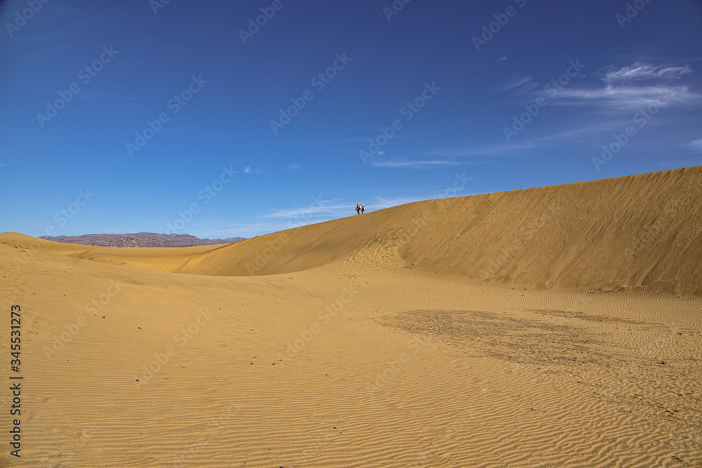 summer desert landscape on a warm sunny day from Maspalomas dunes on the Spanish island of Gran Canaria summer desert landscape on a warm sunny day from Maspalomas dunes on the Spanish island of Gran Canaria