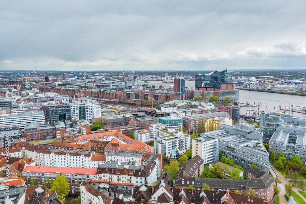 Fototapeta premium Aerial view of downtown of Hamburg, Germany, view from the clock tower of Church of St. Michael. A landmark of the city and considered to be one of the finest Hanseatic Protestant baroque churches