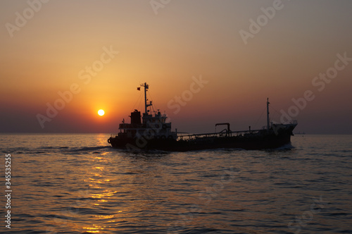 beautiful sunrise and ship on sea  © rokacaptain