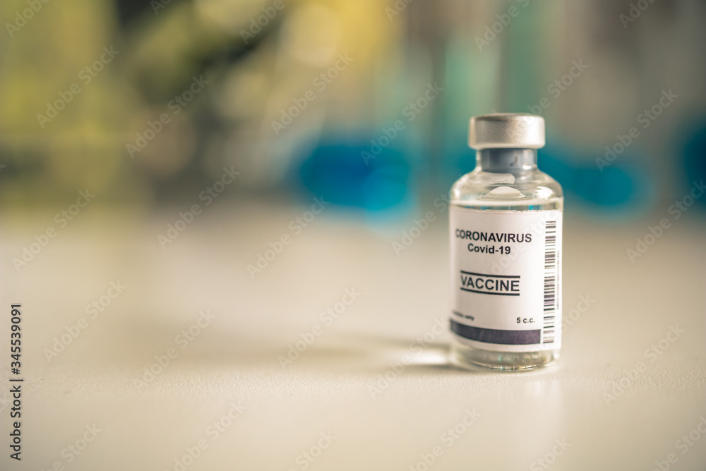 Close-up on Laboratory Tube Virus corona covid 19 vaccine. Scientist research for new novel corona virus immunization drug concept. Coronavirus COVID-19 vaccine vial and injection syringe. Close-up on Laboratory Tube Virus corona covid 19 vaccine. Scientist research for new novel corona virus immunization drug concept. Coronavirus COVID-19 vaccine vial and injection syringe.